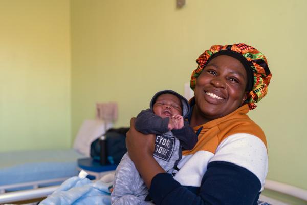 ‘Mampho Mojela with her new born baby Blessings Mojela inside the maternal waiting ward.
