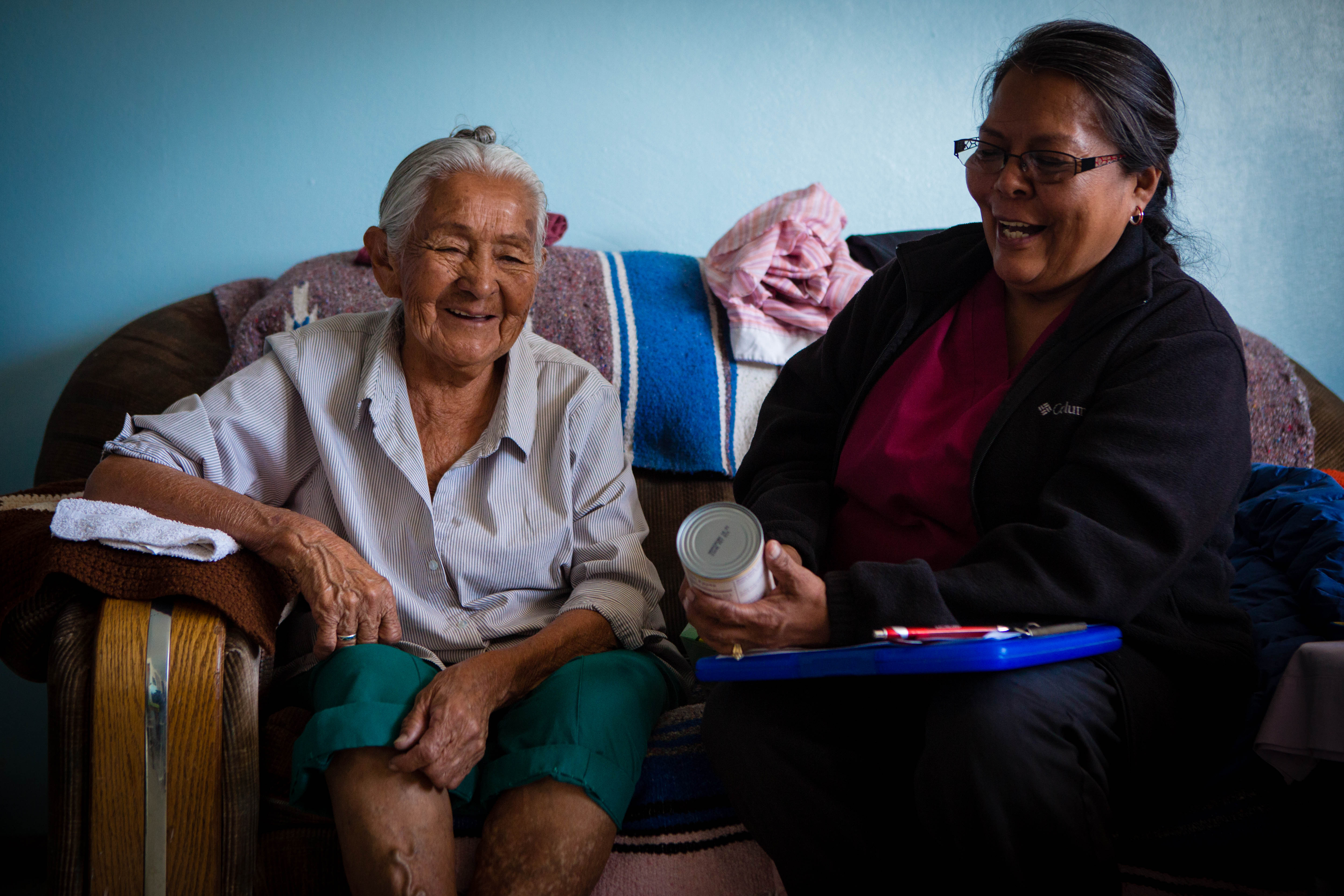 Davis and Williams (right) go over nutrition information together.