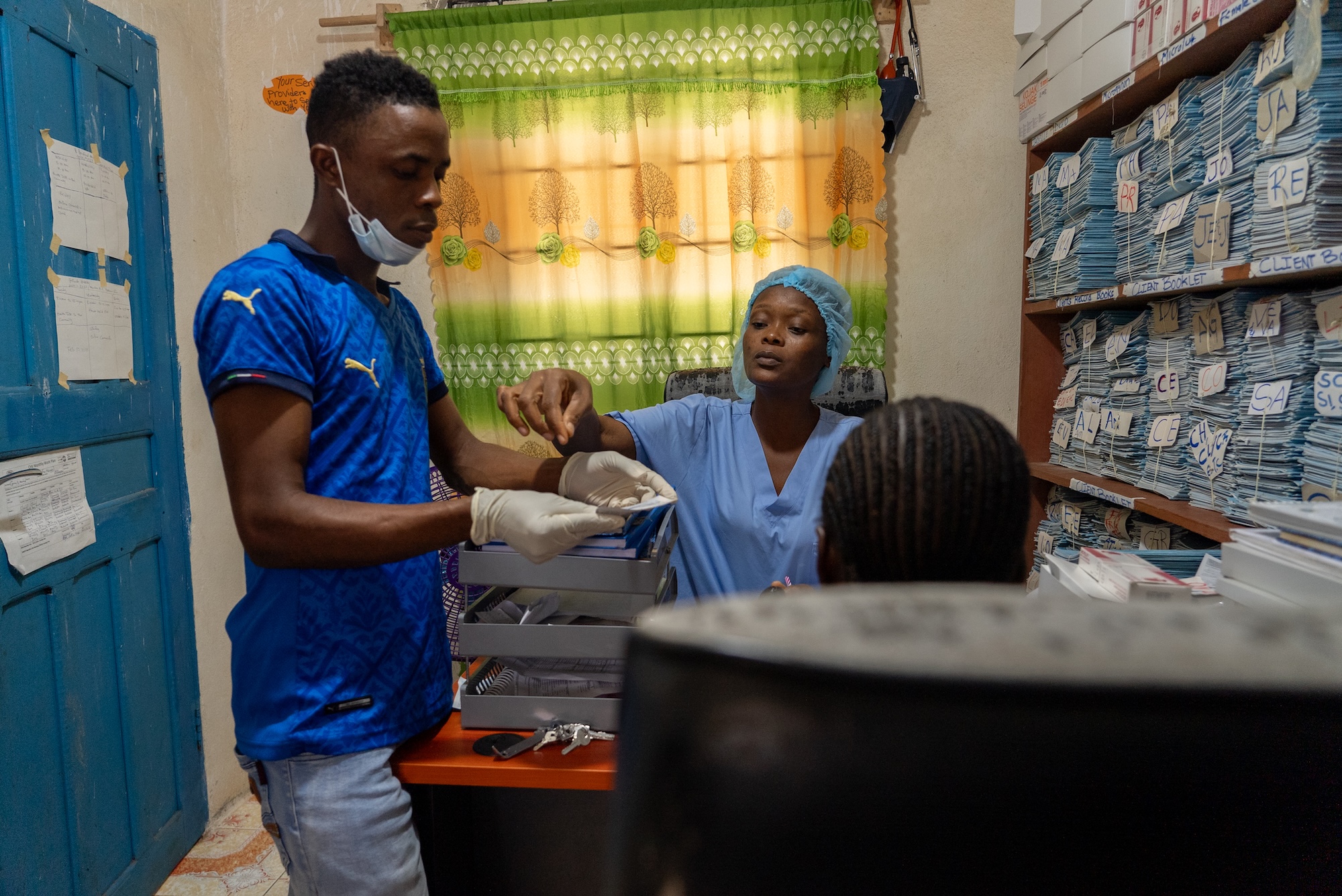 Staff work at the Youth Friendly Center at J.J. Dossen hospital in Harper, Liberia.